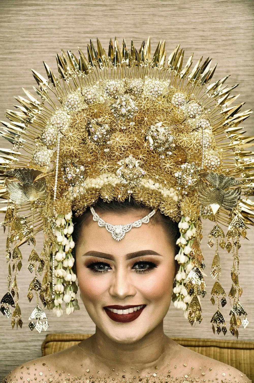 woman wearing brown floral headdress
