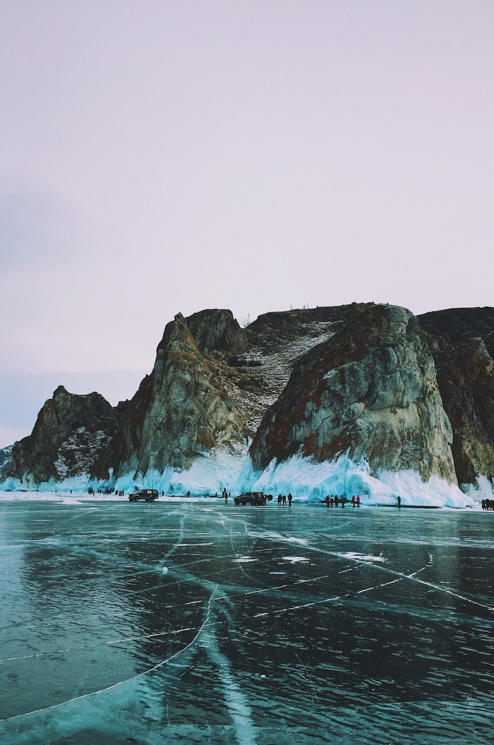 mountain cliff beside beach