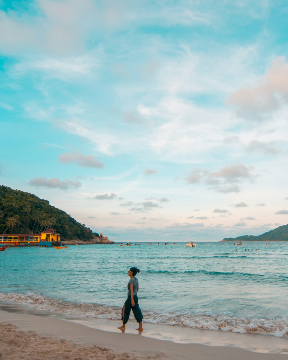 woman walking on the seashore