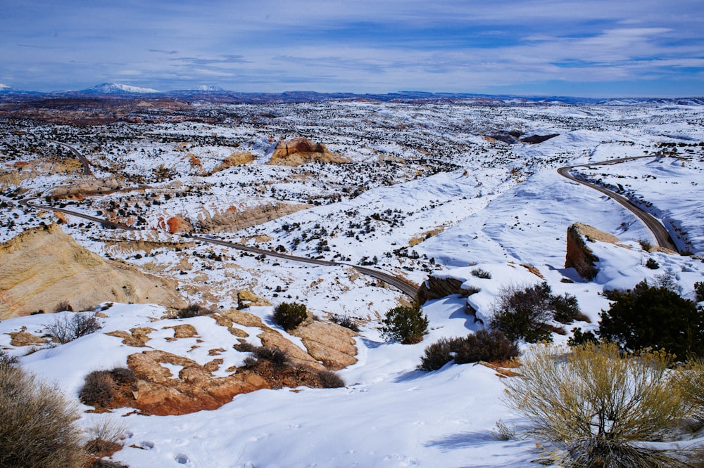 field covered with snow during daytime