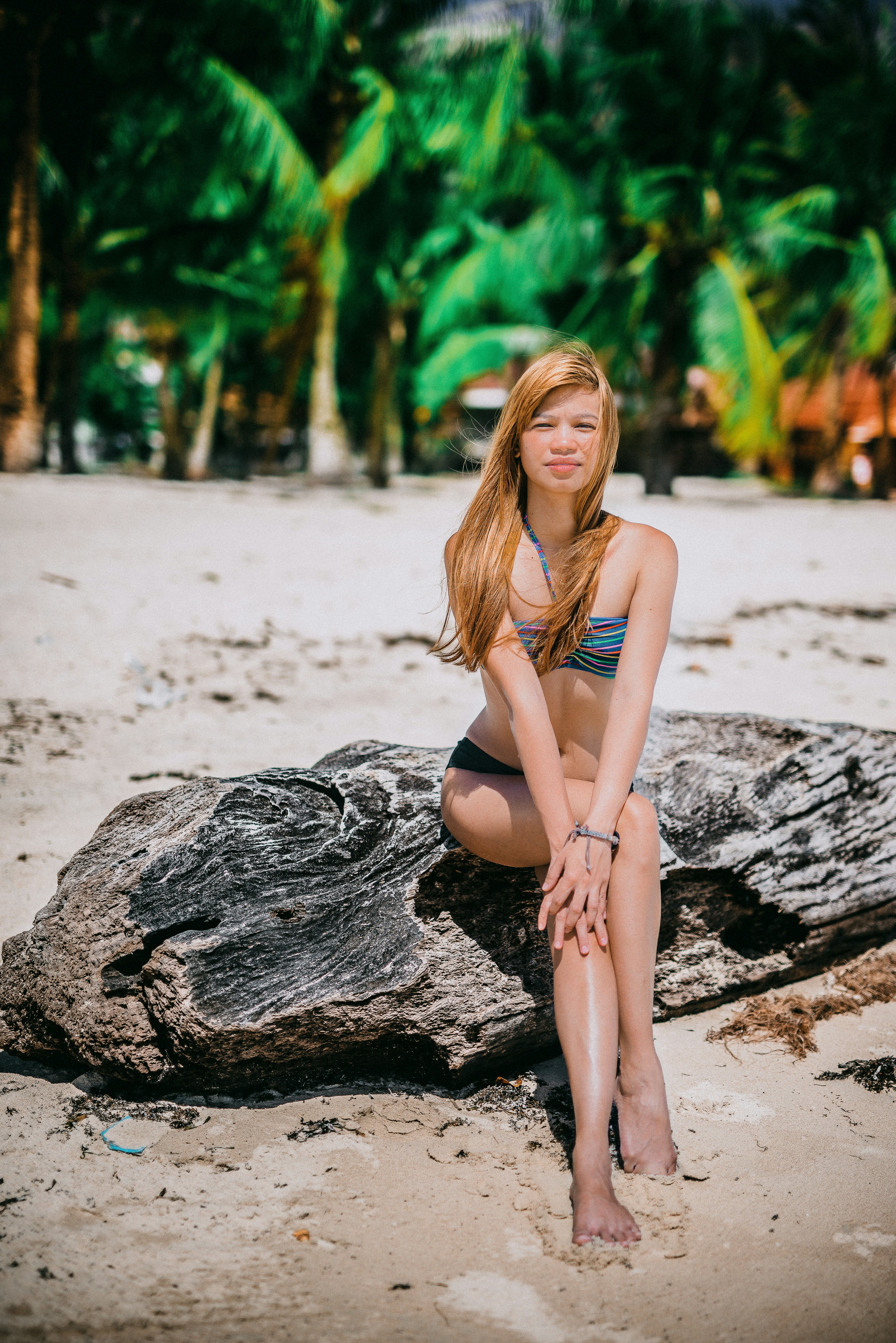 great photo recipe,how to photograph woman in bikini sitting on rock
