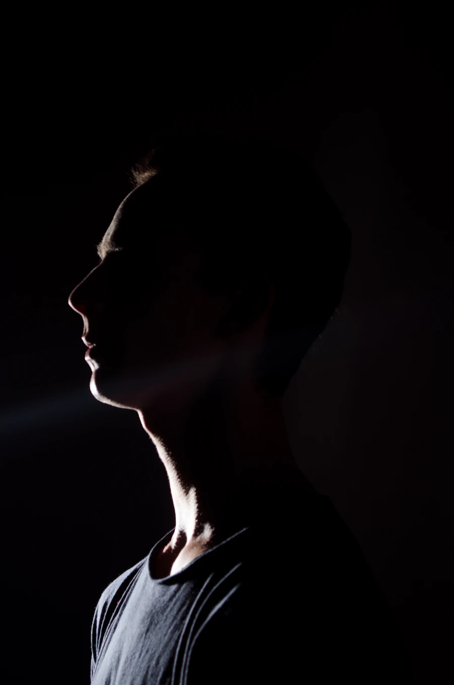 Backlit silhouette — placeholder portrait for Mpho Ratliff