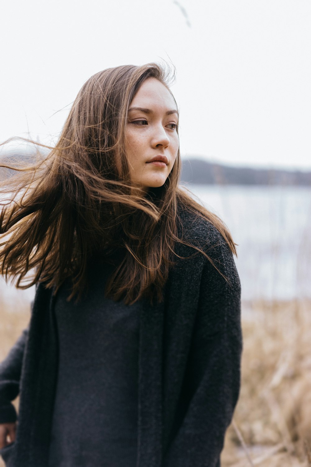 woman wearing black zip-up jacket