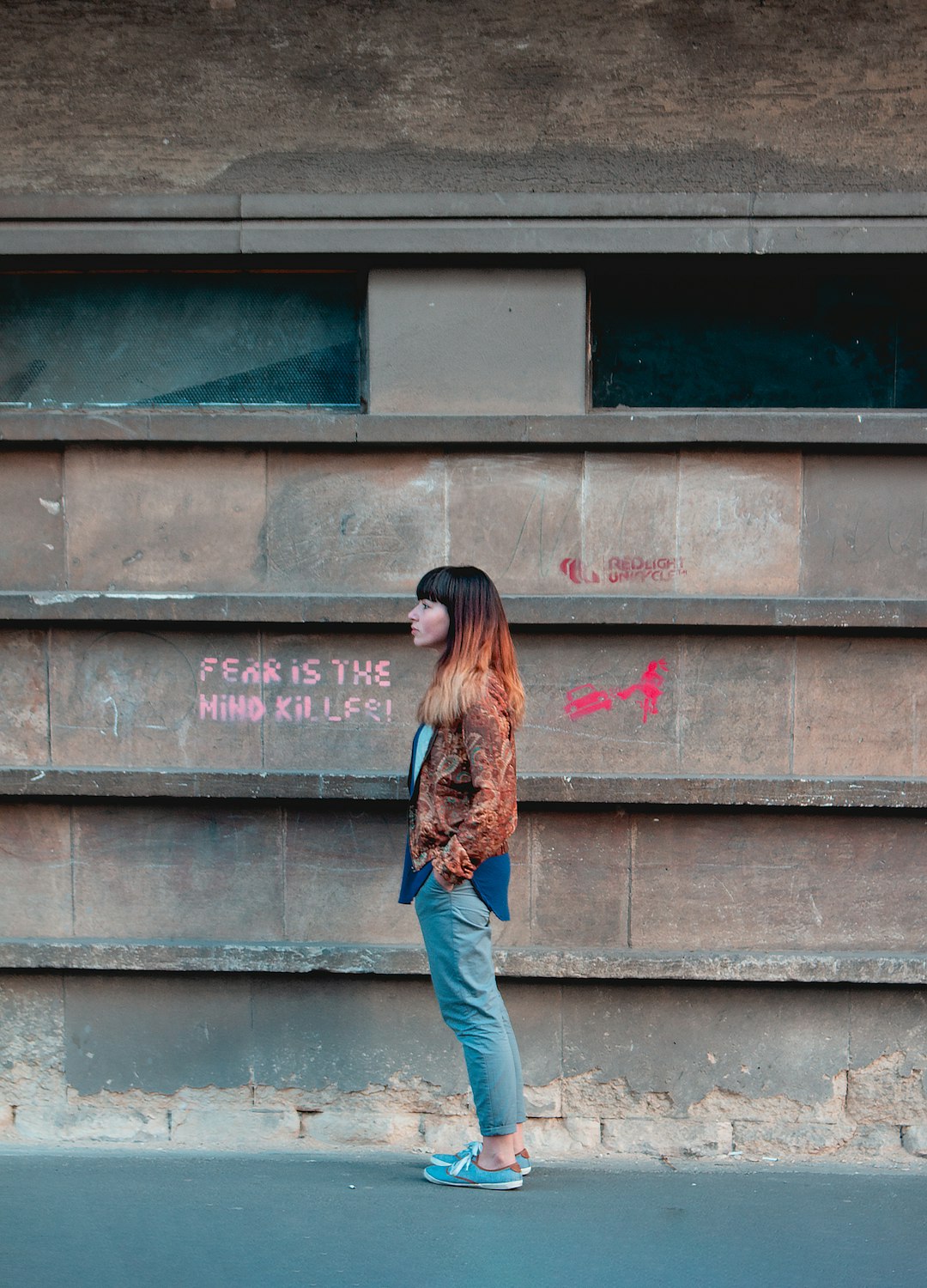 woman standing by wall