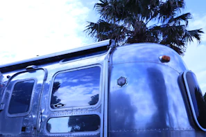 High-angle view of a stylish roof rack mounted on a trailer under a clear blue sky