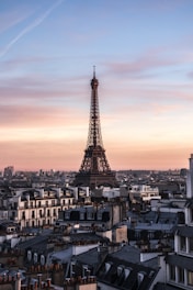 Eiffel Towe over the buildings