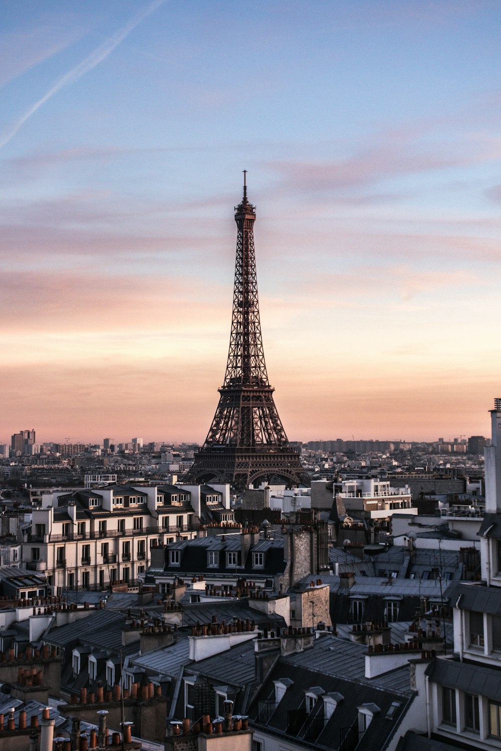 Eiffel Towe over the buildings