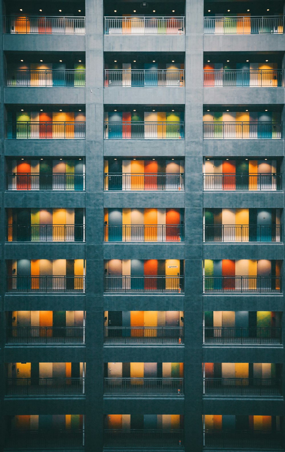 a tall building with lots of windows and balconies