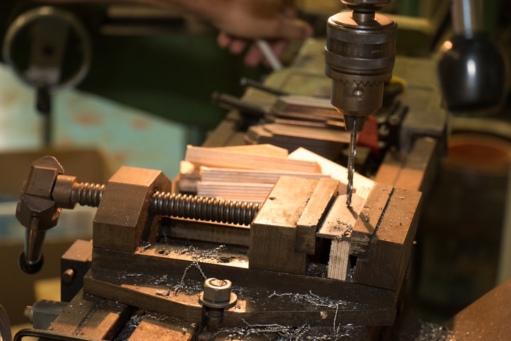 hand drill on bench vise