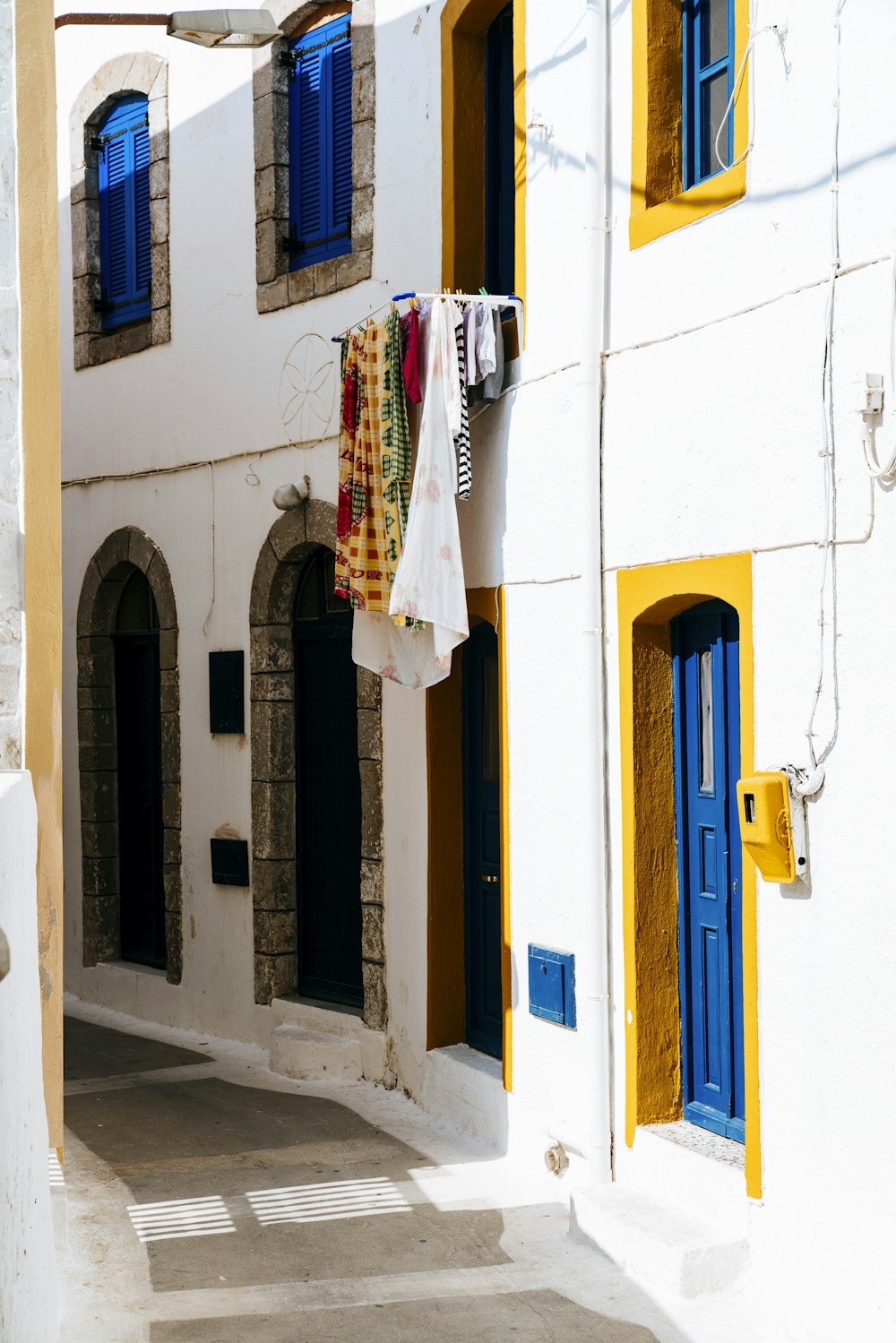 white and yellow concrete house