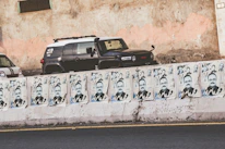 A colorful mock campaign poster featuring a fictional 2028 candidate.