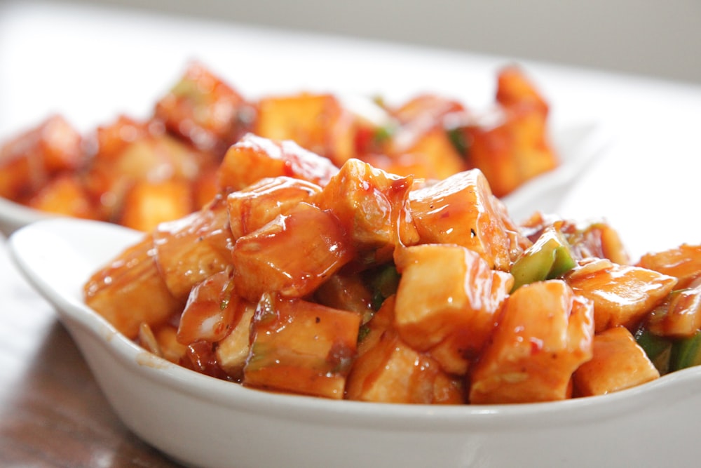 cooked food on white ceramic bowls