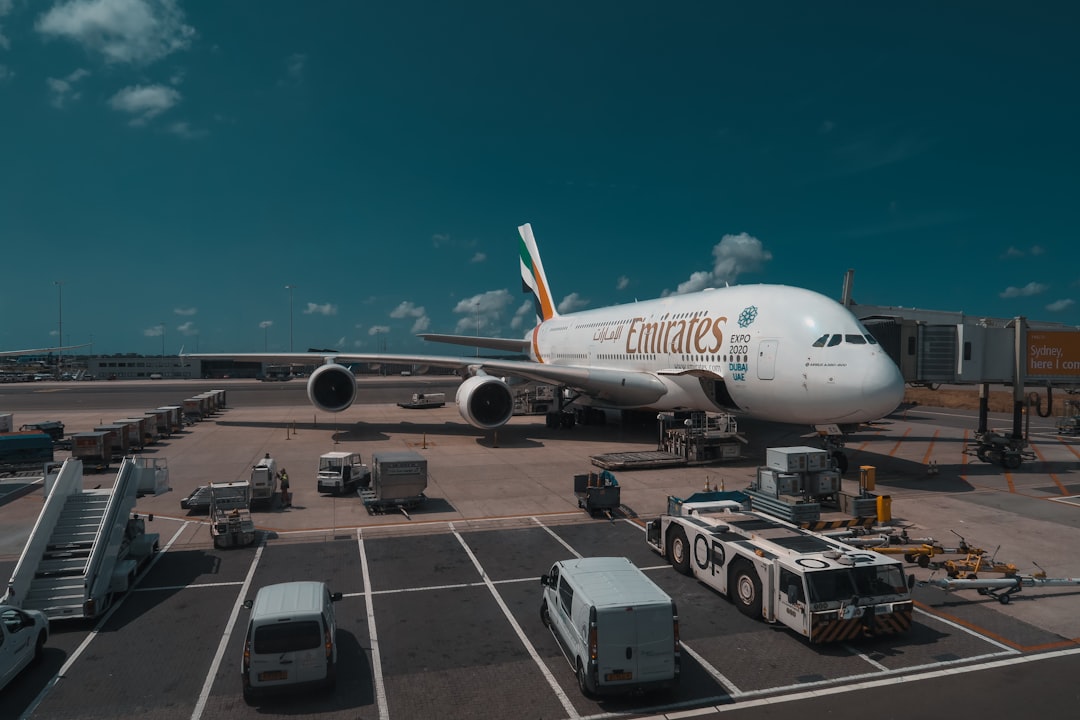 white Emirates plane,