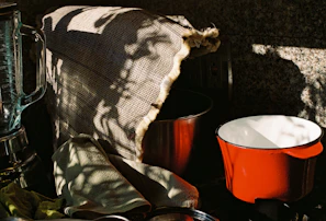 Brightly lit kitchen scene featuring a modern blender in action