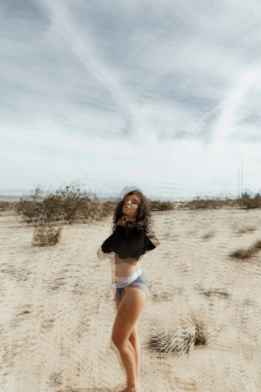 woman standing while wearing bikini