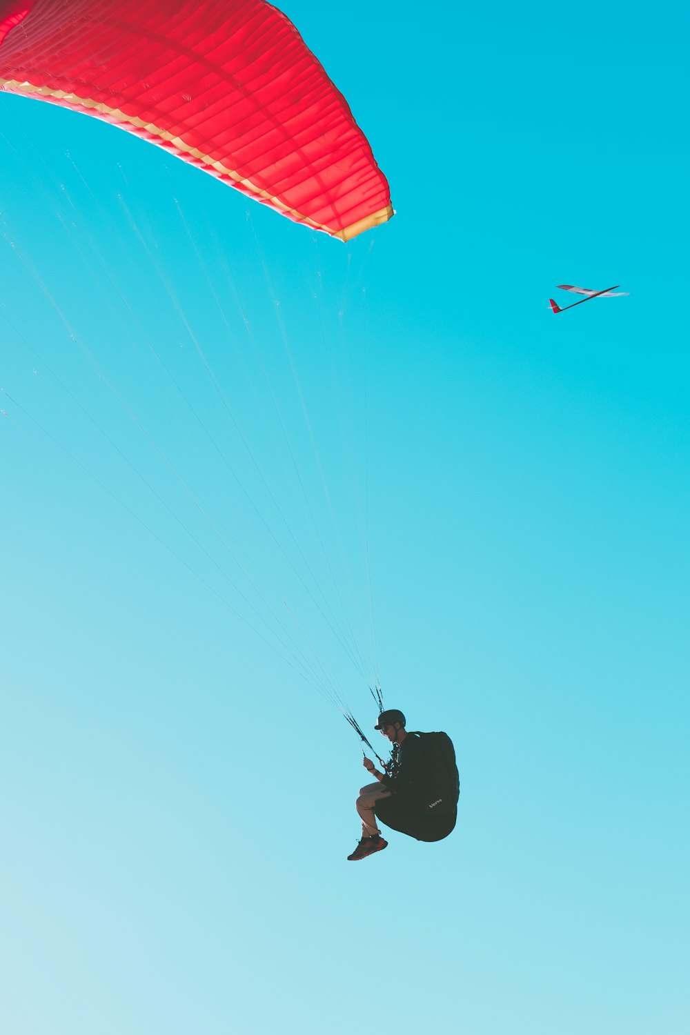 person parachuting at daytime