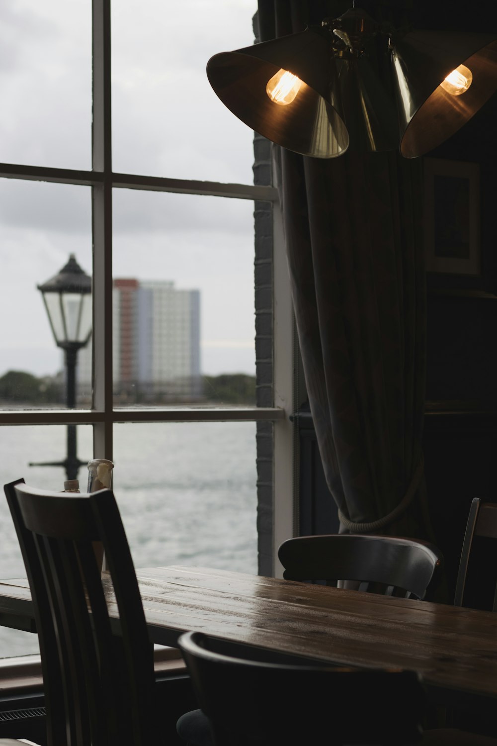 vacant chairs near window