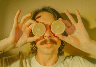 person holding lemon