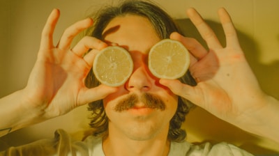 person holding lemon