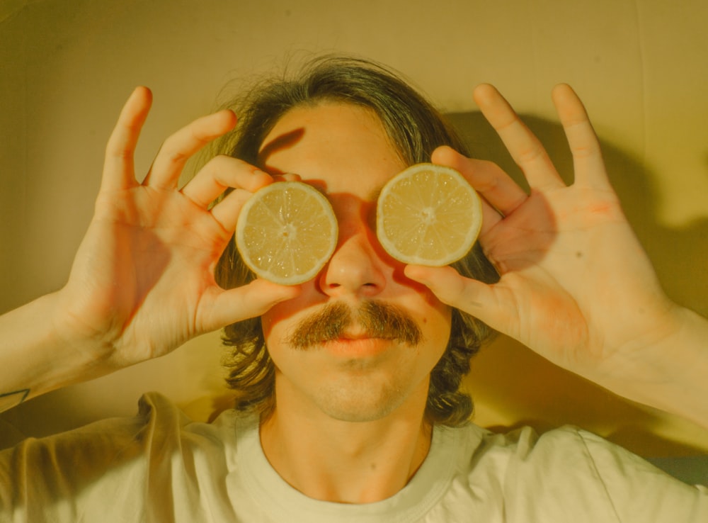 person holding lemon