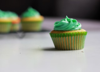 green cupcake selective photography