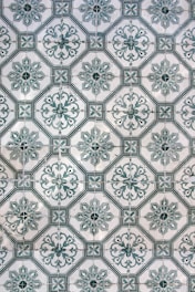 a close up of a wall with a pattern on it