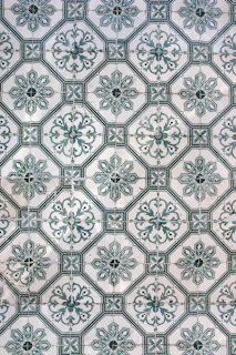 a close up of a wall with a pattern on it