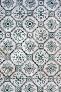 a close up of a wall with a pattern on it