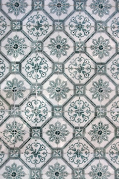 a close up of a wall with a pattern on it
