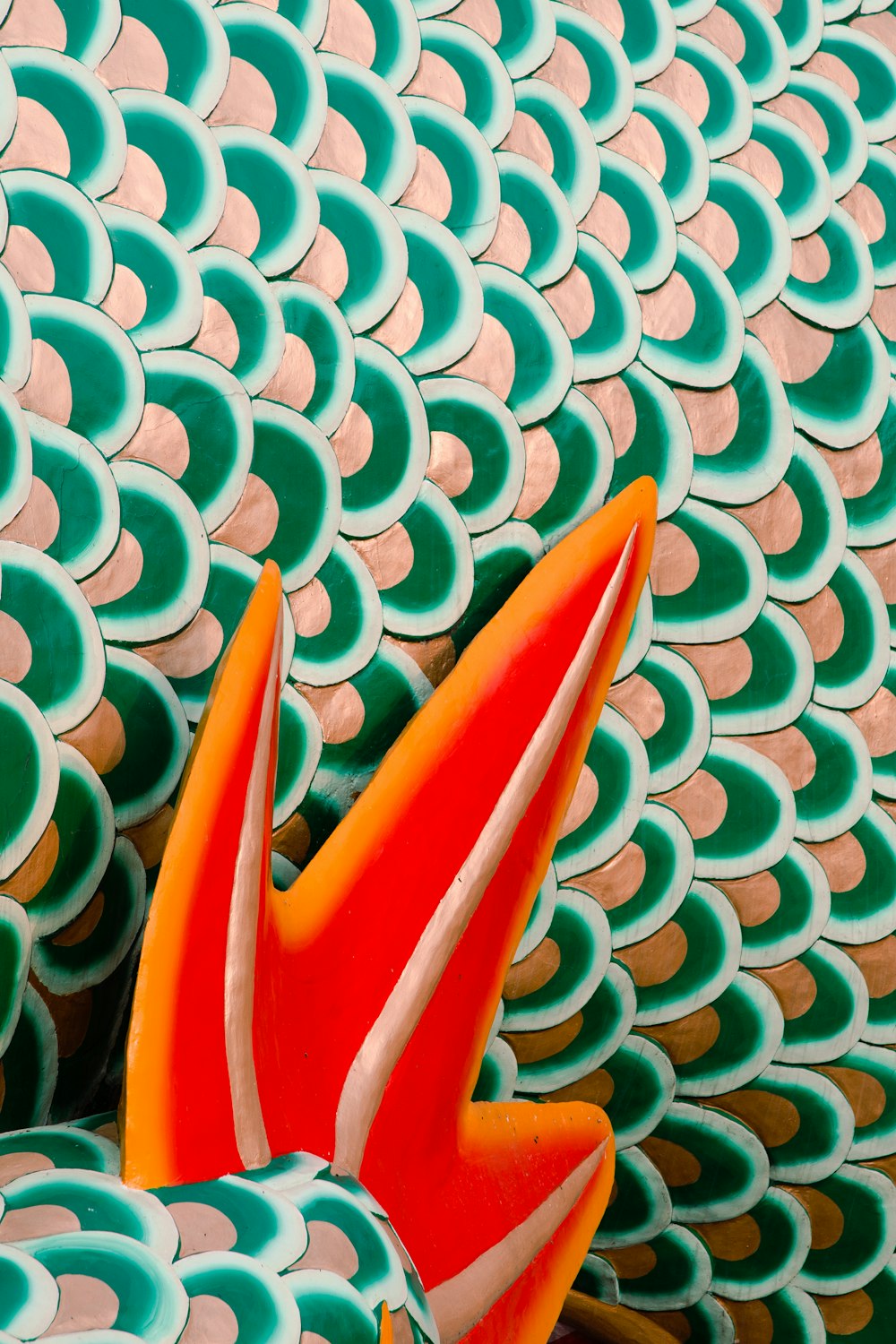 a close up of a red and orange object
