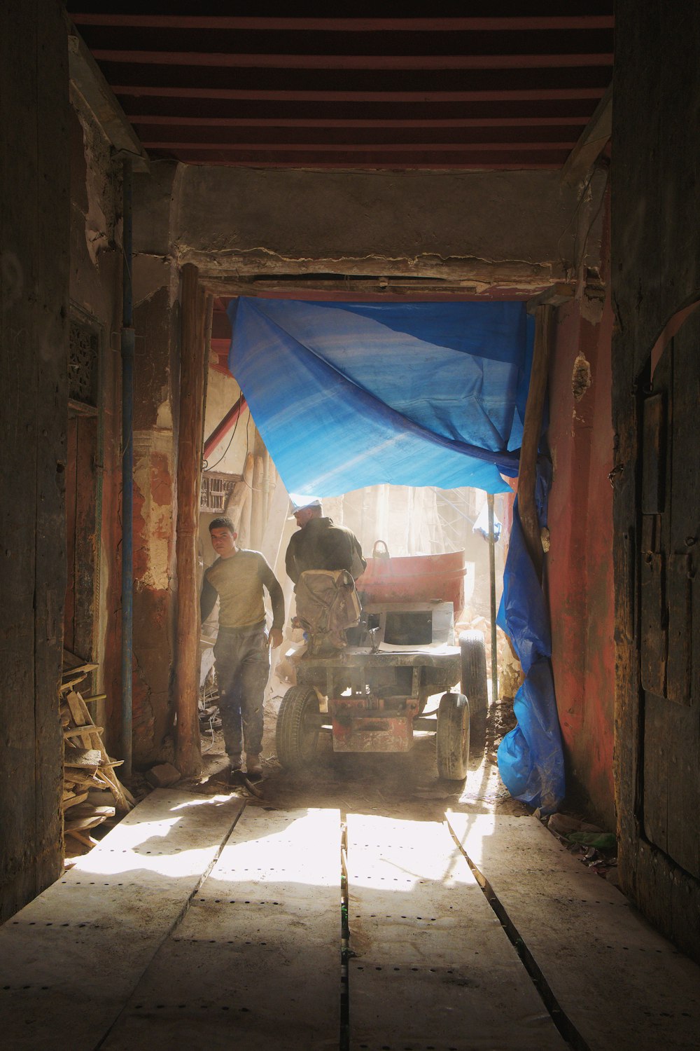 man riding vehicle inside tunnel