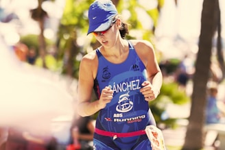 woman wearing blue tank top