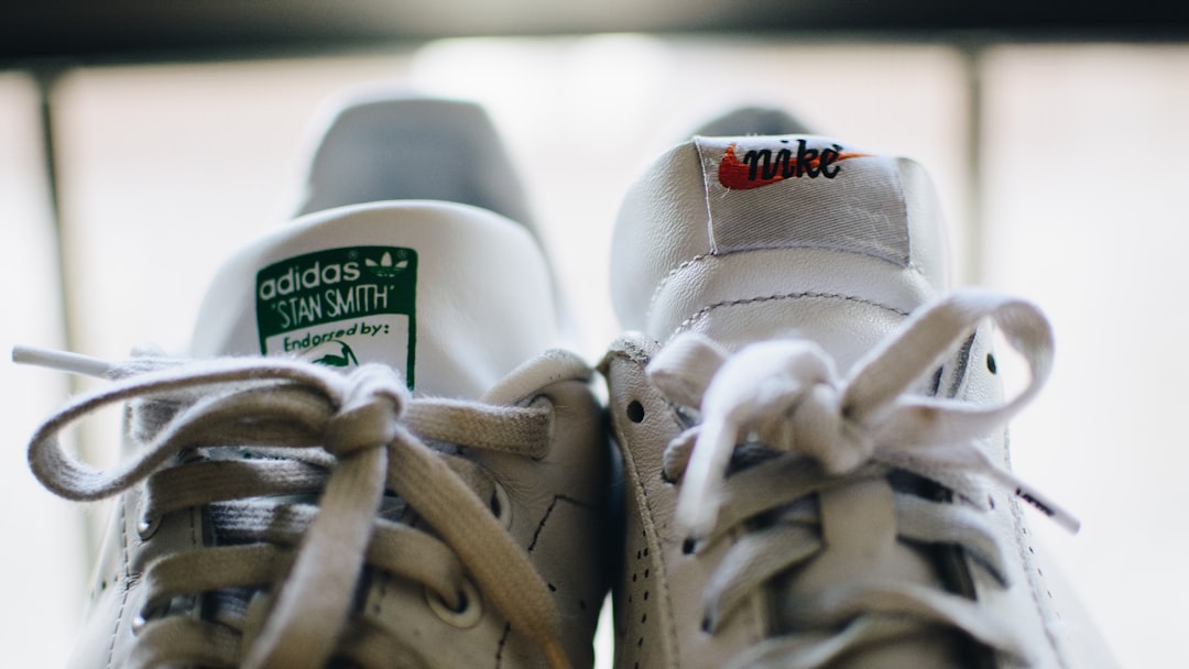 white adidas low-top sneakers