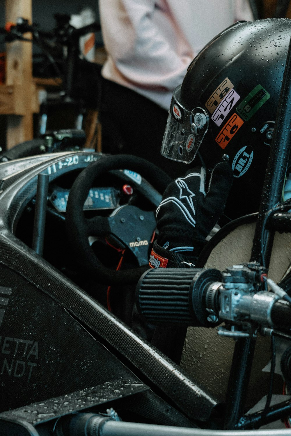 close view of man inside racing car