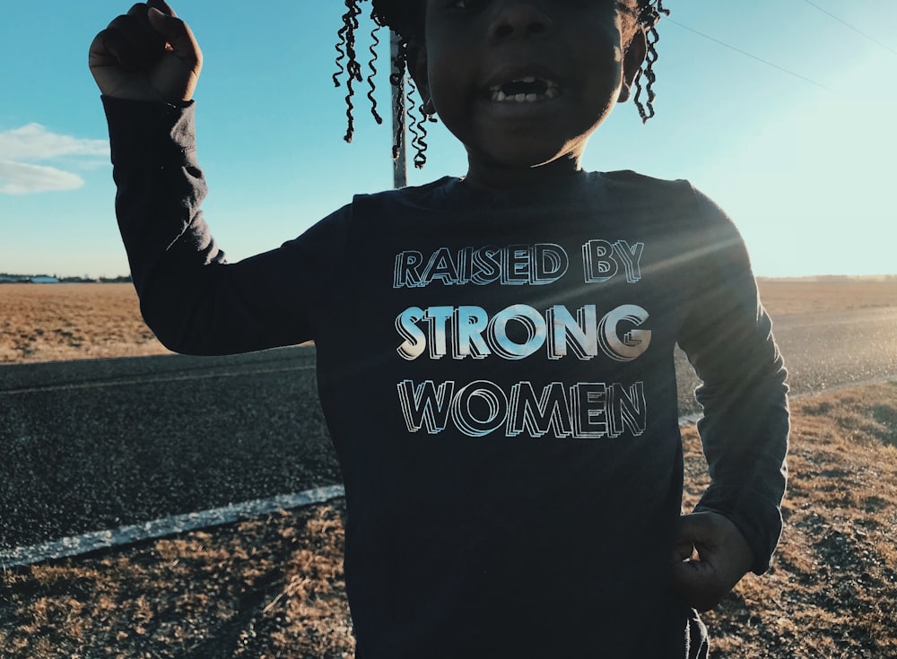 girl wearing black long-sleeved shirt