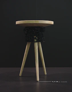 Ancient Lega stool crafted from dark wood, showcasing expert craftsmanship and cultural symbolism.