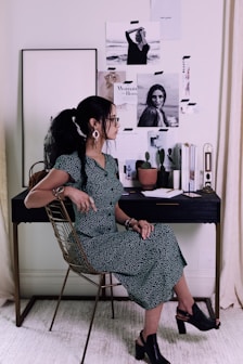 woman sitting on chair with cross legs