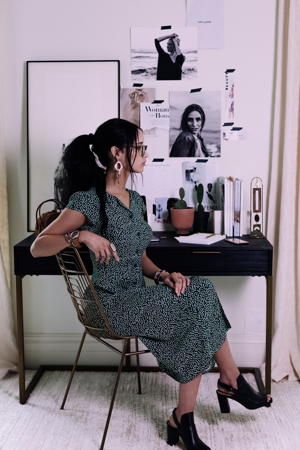 woman sitting on chair with cross legs