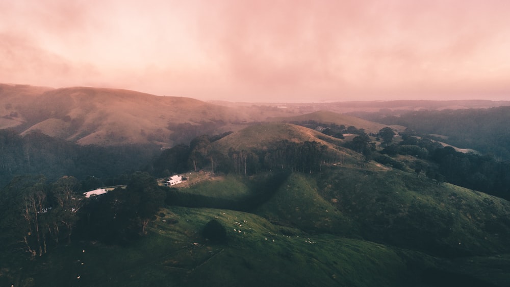 aerial photography of green mountain ranges