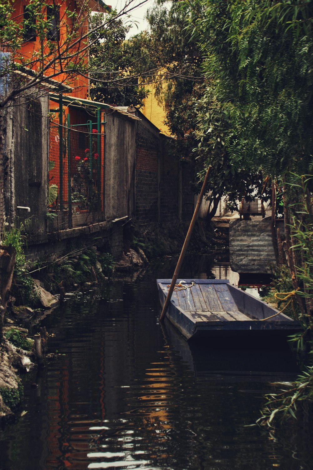 brown boat on body of water