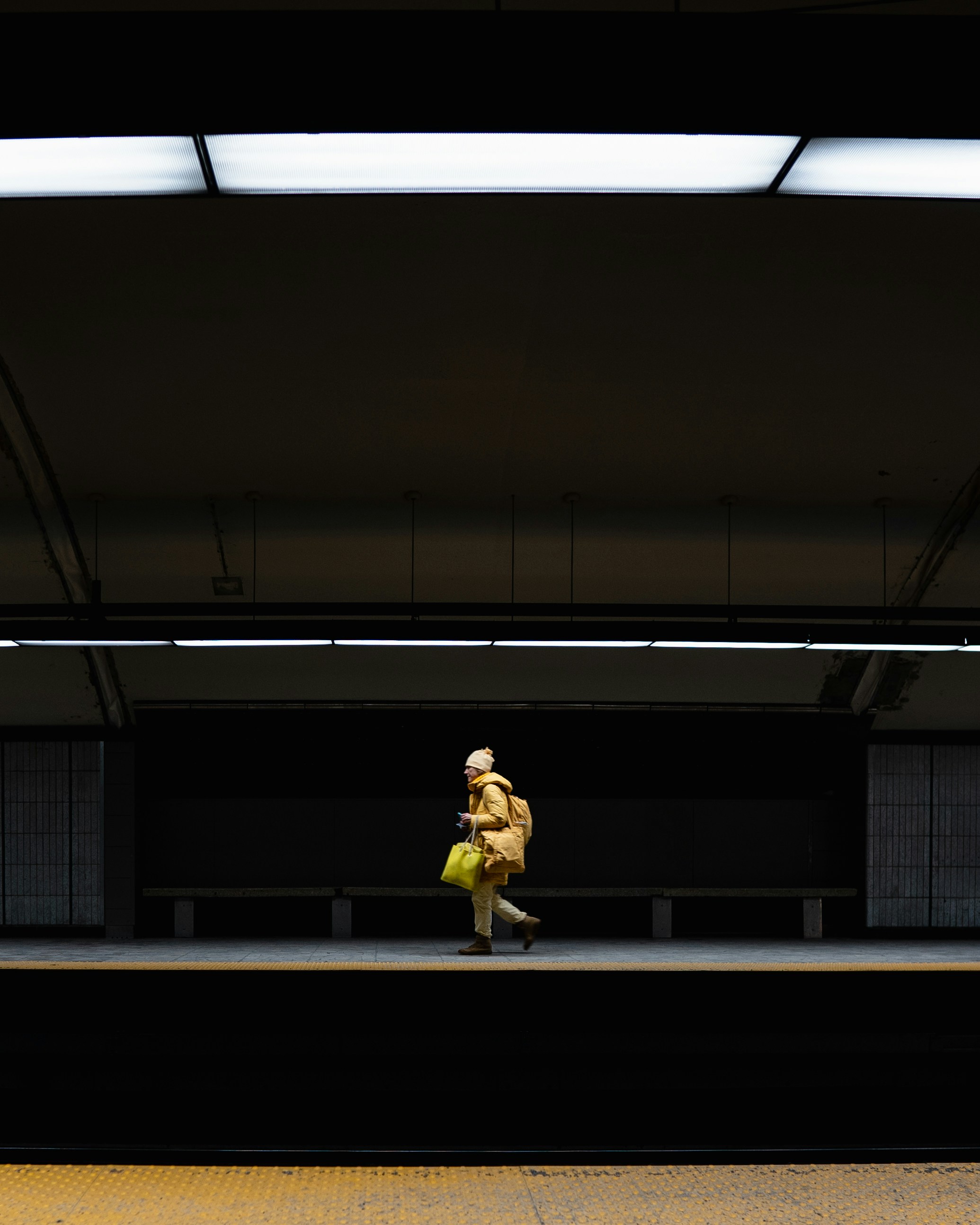 person walking on building interior
