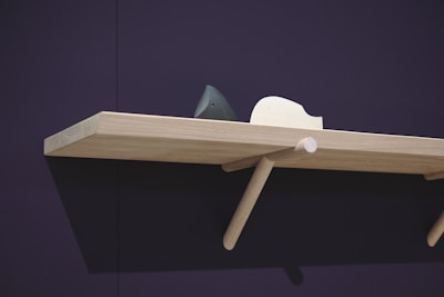 brown wooden floating shelf