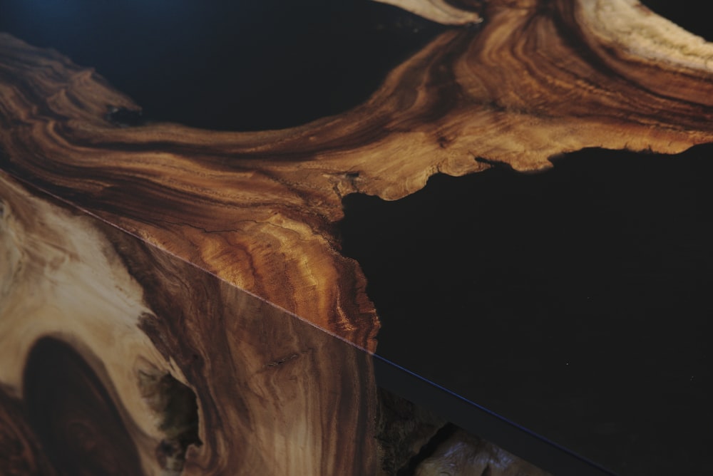 a piece of wood with a black background