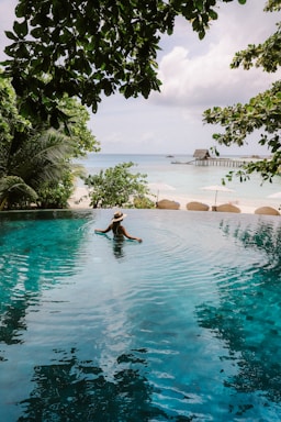 woman on body of water during daytime