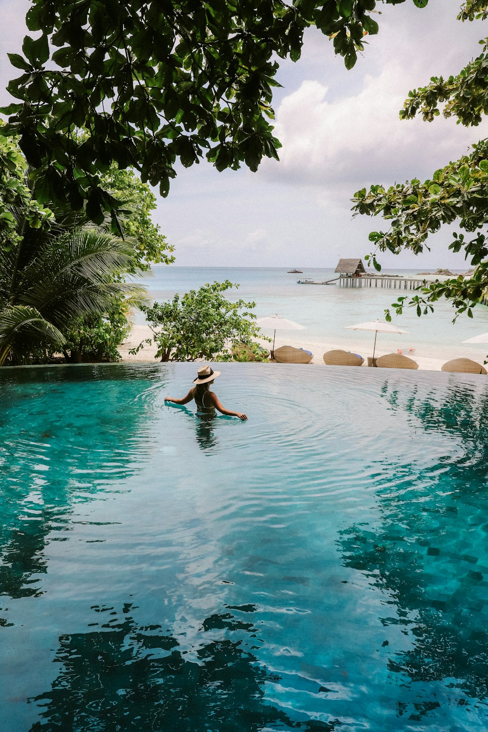 woman on body of water during daytime