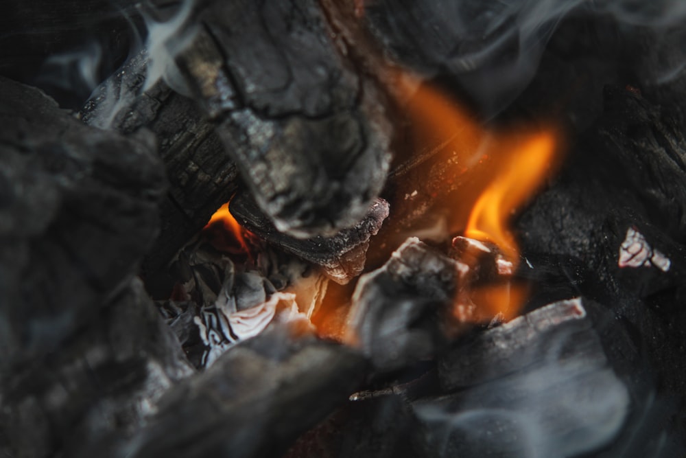 a close up of a fire burning in a fireplace