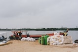 Workers inspecting imported rubber materials at the dock