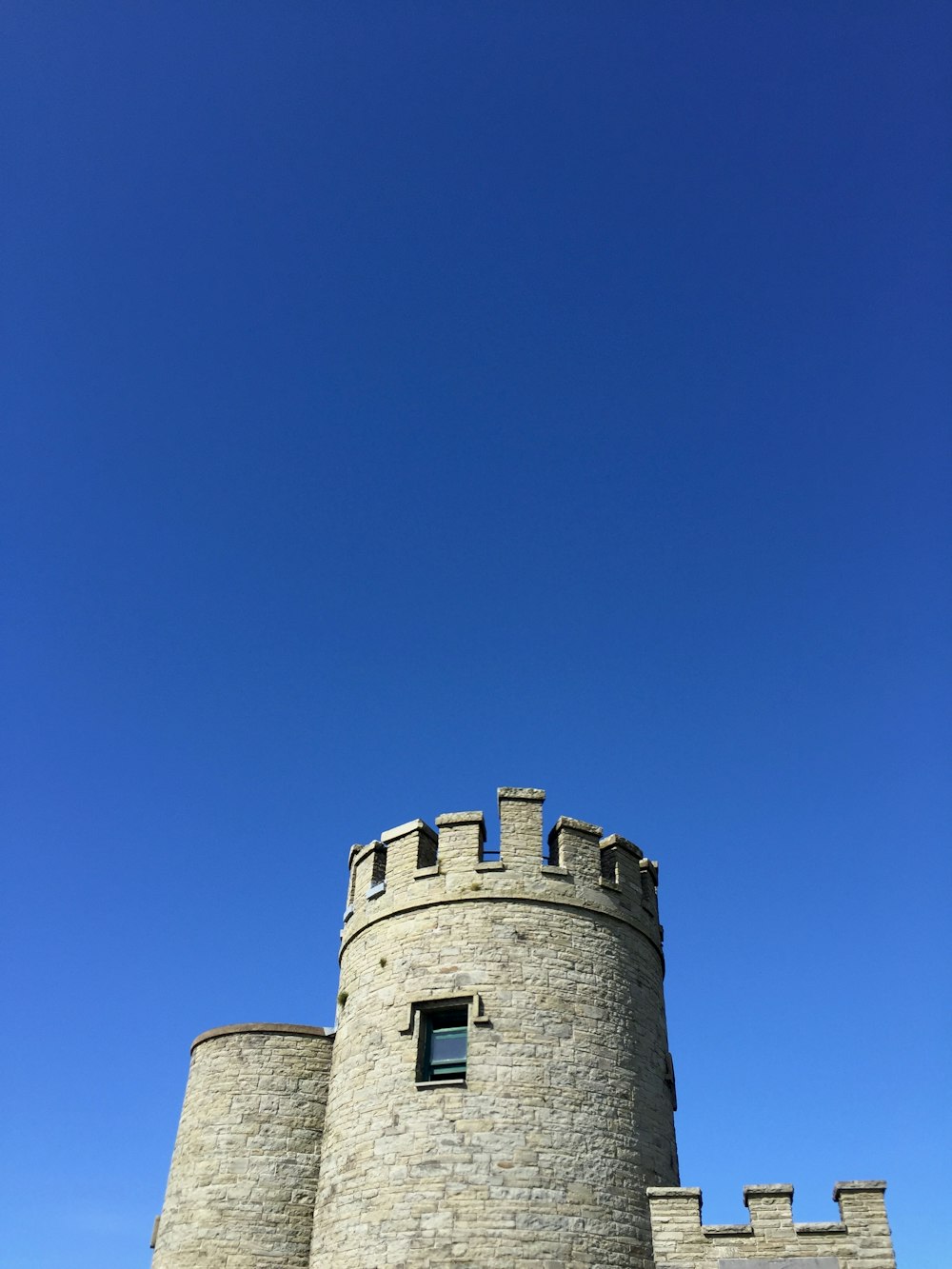 gray concrete tower under blue sky during daytime \