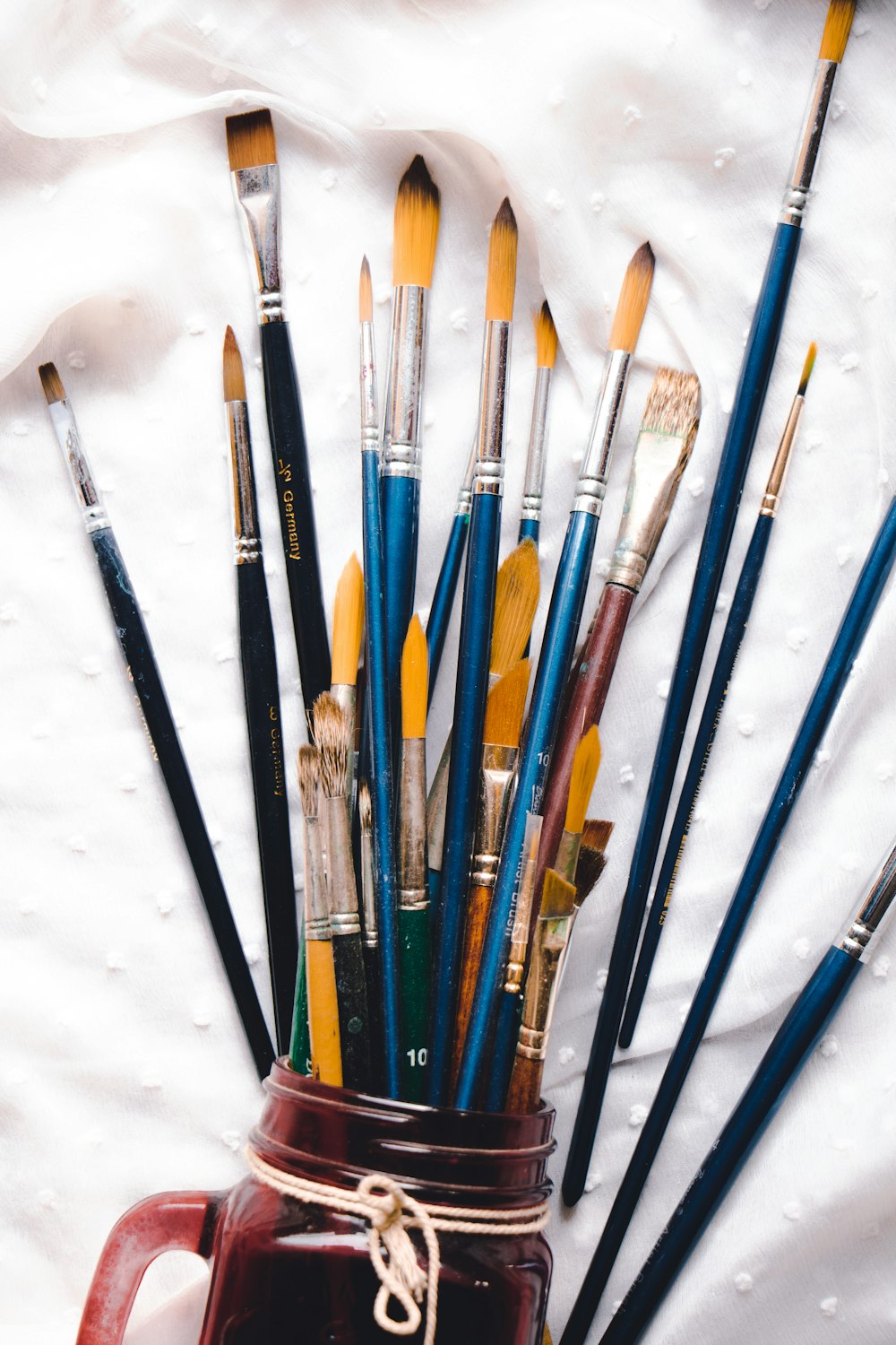 assorted-colored brushes