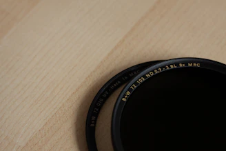 Precision optical filters arranged neatly on a clean white surface.